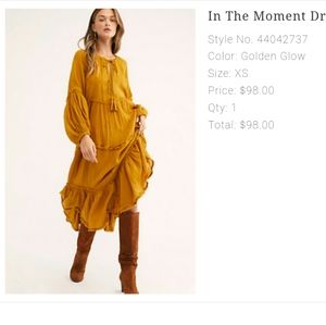 Rare Free people in the moment dress.